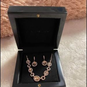 Givenchy necklace and earrings. Was a gift and never worn. Never out of the box